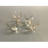 Four early wine glasses.