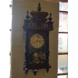 A Victorian mahogany case wall clock.