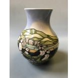 A Moorcroft bulbus vase decorated with puffins 1997 signed on base (second) 23 1/2cm.