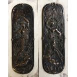 Two Victorian stamped bronze plaques on marble depicting female and cherubs with seal on back,