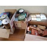 Two cartons of tin boxes, box of Leanoards cottages and a box of ornaments.