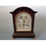 A mahogany cased bracket clock with silvered dial on gilt feet, name on back Wurtenberg B21 38cm