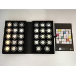 The Royal Mint London 2012 Silver 50p Sports Collection twenty-nine-coin collection, with
