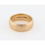 A 9ct yellow gold wedding band, hallmarked Birmingham 1965.