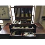 An oak cased cutlery set Harrison Bros & Howson fitted with two drawers.