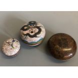Three circular cloisonne trinket boxes, one with dragon design 9.5cm, and two with floral designs,