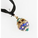 A modern Russian egg charm / pendant, featuring blue and green enamel and set with malachite,