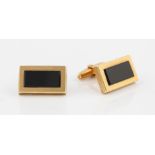 A pair of 9ct yellow gold onyx cufflinks, hallmarked with Birmingham import mark for 1975, weight