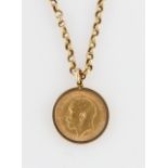 A George V 1914 half sovereign, mounted in hallmarked 9ct yellow gold pendant mount, on an