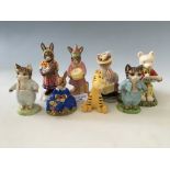 A collection of Royal Doulton figures to include "Summer Lapland", "Tom kitten" etc, together with