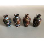 Four small cloisonne vases, one floral and butterfly decoration, 9 cm high, others are floral