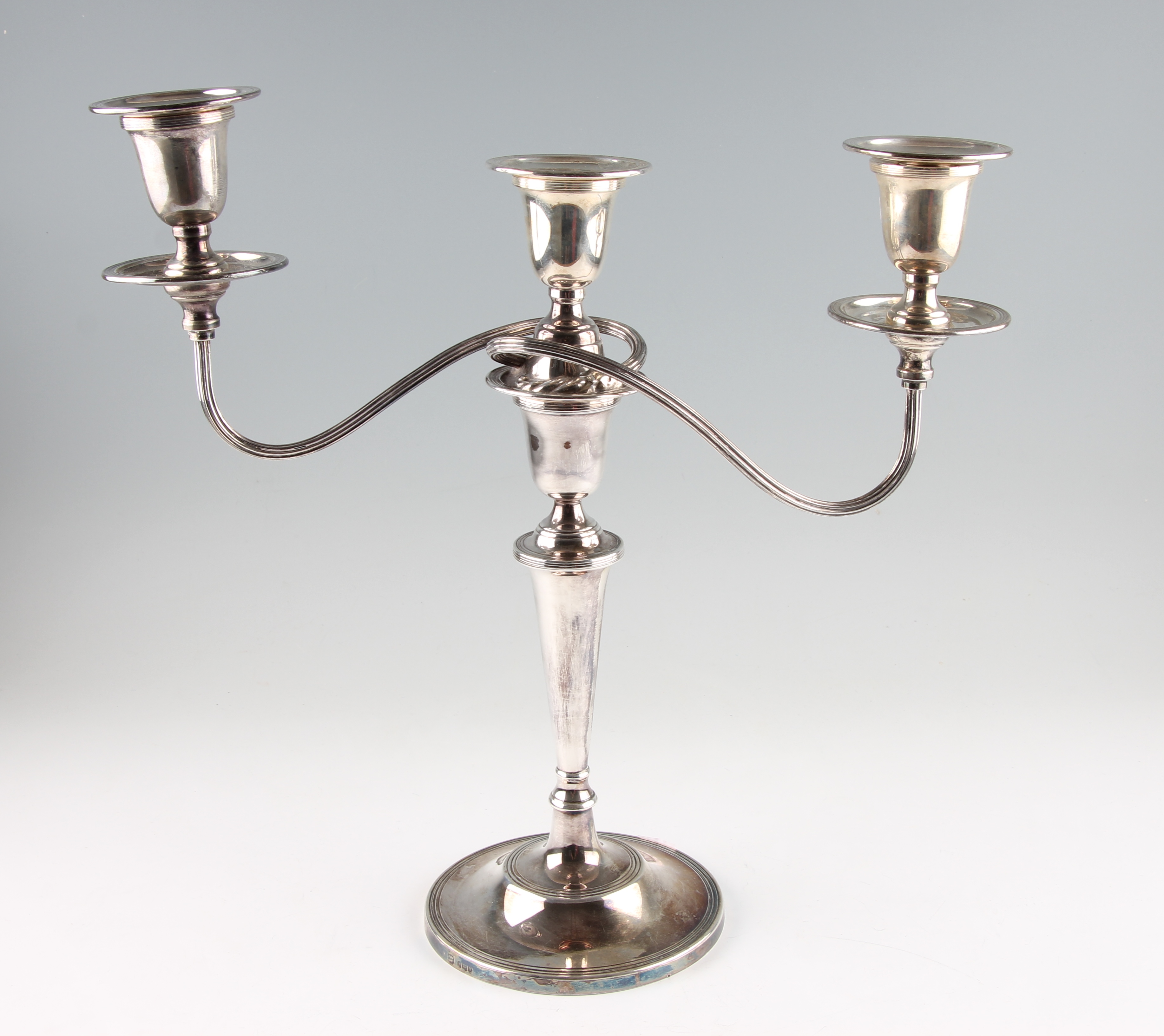 A single silver weighted candelabra, with knopped stem on circular foot, hallmarked Sheffield