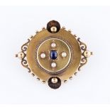 A sapphire and pearl memorial brooch, the circular design featuring a central oval cut sapphire