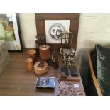 A Fornasetti wall plaque, framed oil paintings of still life, a wooden figure, brass weights etc.