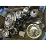 A box of various silverware.