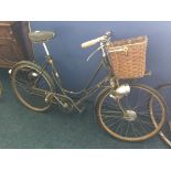 A ladies BSA bicycle with wicker basket to front