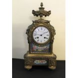 A French bronze ormolu Miroy Freres and Fils mantle clock, with porcelain Serves panels to front and