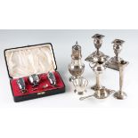 A collection of silverware, to include an early 20th Century vase (possibly weighted), a pair of