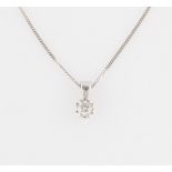 A 9ct white gold diamond pendant, set with a round brilliant cut diamond, measuring approx. 0.