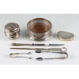 A collection of hallmarked silverware, to include a wine coaster, a pair of sugar tongs, a pair of