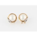 A pair of mabe pearl stud earrings, set with diamond accents, stamped 9ct, width approx. 17mm.