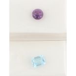 A loose amethyst, diameter approx. 7mm and a loose aquamarine, measuring approx. 8x4mm.