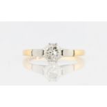 A diamond solitaire ring, set with a round brilliant cut diamond, measuring approx. 0.60ct,