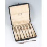 A boxed set of Liberty & Co. silver pastry forks, hallmarked Birmingham 1924, makers mark L&Co,