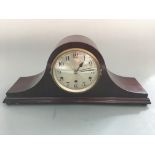 A wooden framed Westminster chime mantel clock.