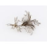 An 18ct white gold diamond flower spray brooch, set with eight-cut diamonds, import hallmark