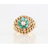 A hallmarked 9ct yellow gold split pearl and turquoise open metalwork ring, the raised spherical
