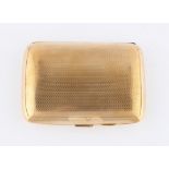 A 9ct yellow gold cigarette case, of rectangular form with machined design, interior featuring
