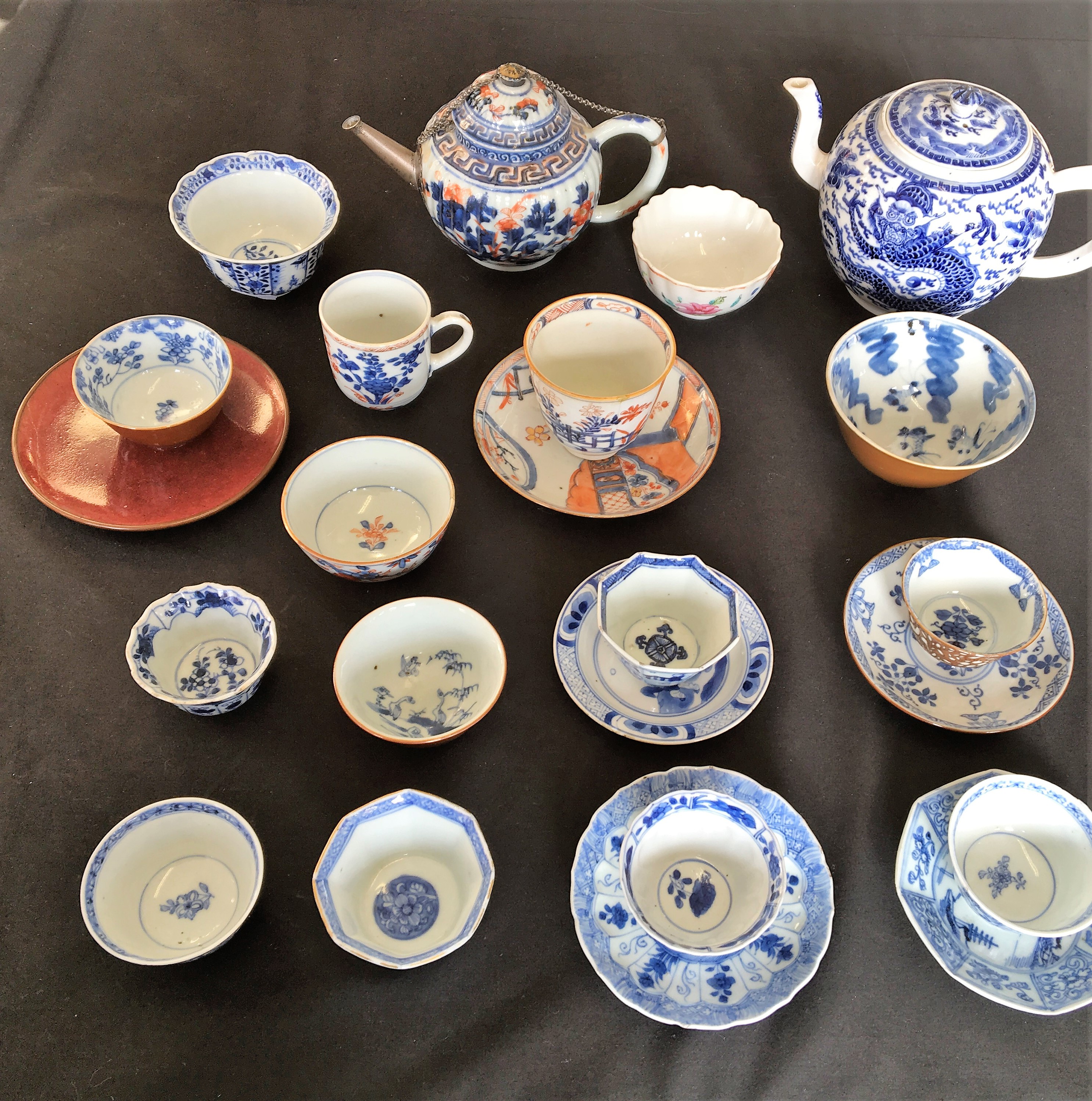 A selection of eighteenth Century Chinese teaware including teapots, cups, saucers and bowls, twenty