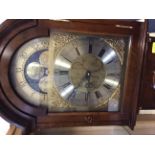 A reproduction mahogany Comitti long case clock.