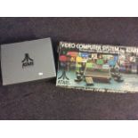 Atari model no. CX-2600 video computer system with original box.