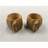 A pair of Mouseman napkin rings.