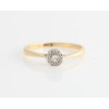 A diamond solitaire ring, set with a round brilliant cut diamond, measuring approx. 0.15ct,