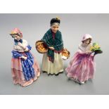 Three Royal Doulton female figures, Orange Lady HN 1453, The New Bonnet HN 1728, Christine HN 1840.