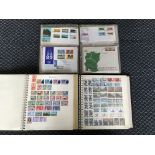 A world collection of mint and used stamps with first day covers in eight albums.