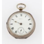 A silver Waltham key wind open face pocket watch, the white enamel dial having hourly Roman