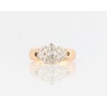 A diamond solitaire ring, bezel set with a marquise cut diamond, measuring approx. 0.50ct, with