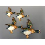 Four Beswick flying ducks.