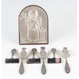 A set of three silver spoons and pushers, each featuring nursery rhyme design, mostly hallmarked