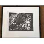 A pair of framed, glazed, signed with initials F.M.T. black and white linocuts, one with textile and