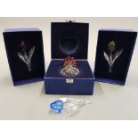 Four boxed Swarovski coloured glass items, vase of flowers with Certificate and three single