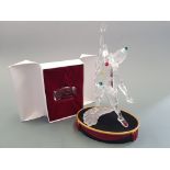 A boxed Swarovski figure 1999 masquerade 'Pierrot' with stand and name plaque, by Adi Stocker.