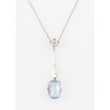 A synthetic blue spinel and white sapphire necklet, the emerald cut blue spinel suspended from