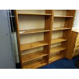 Two pine free-standing bookshelves.