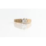A hallmarked 9ct yellow gold Cubic Zirconia single stone ring, ring size O.
