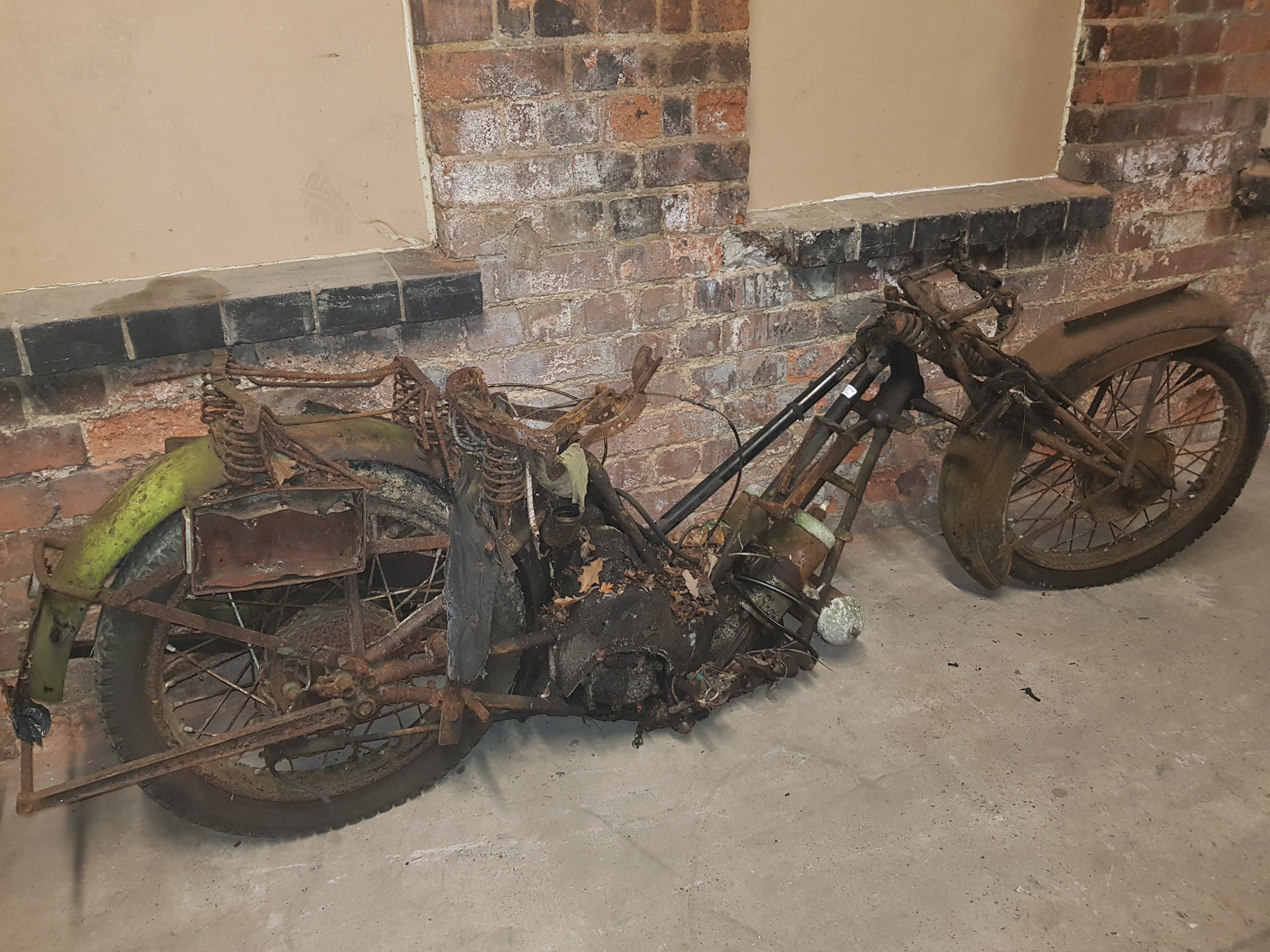 A Vintage Scott Motorcycle, with sidecar frame and motor cycle accessories.